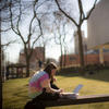 Girl reading on a bench